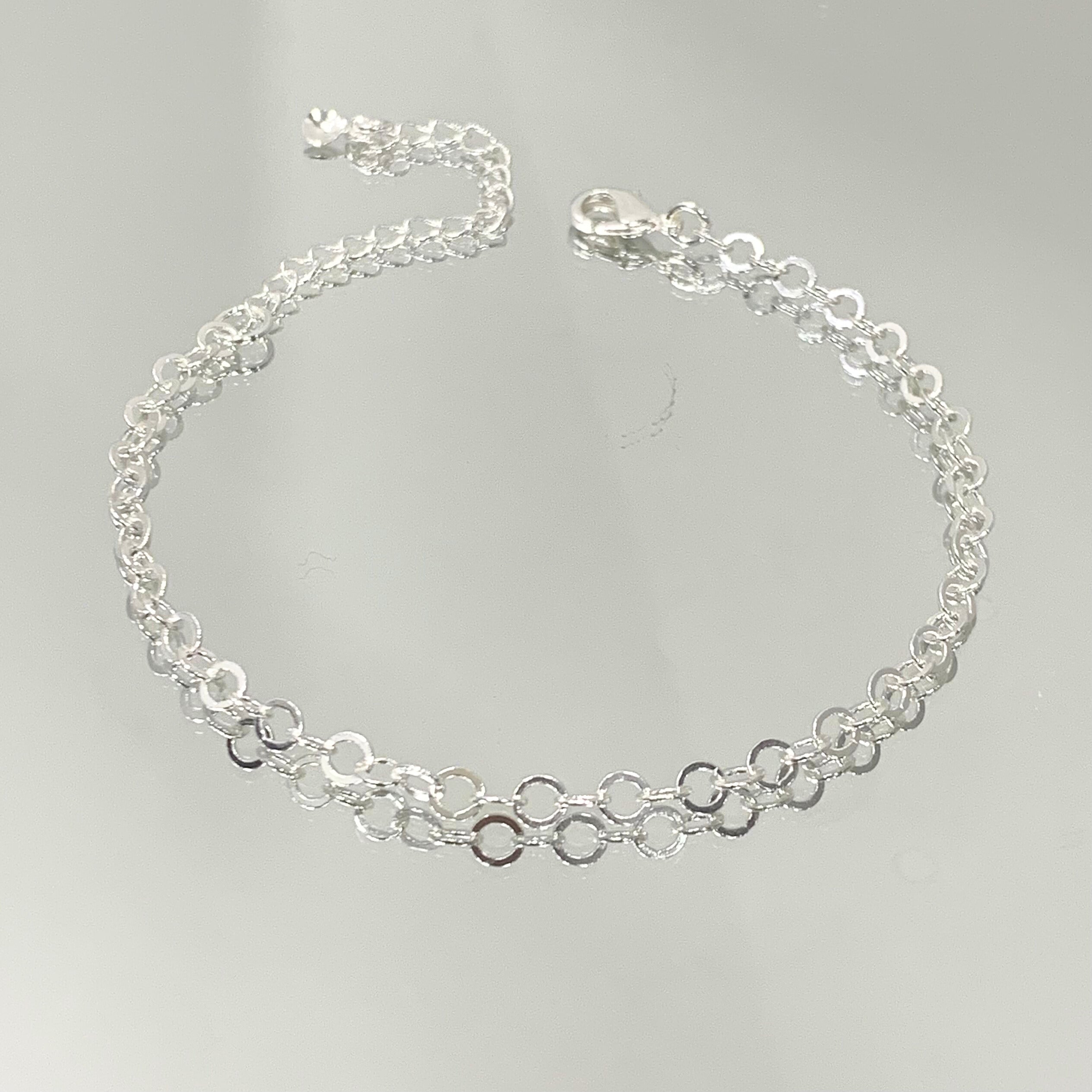 Pulseira Mini Argolas em elos folheada a prata