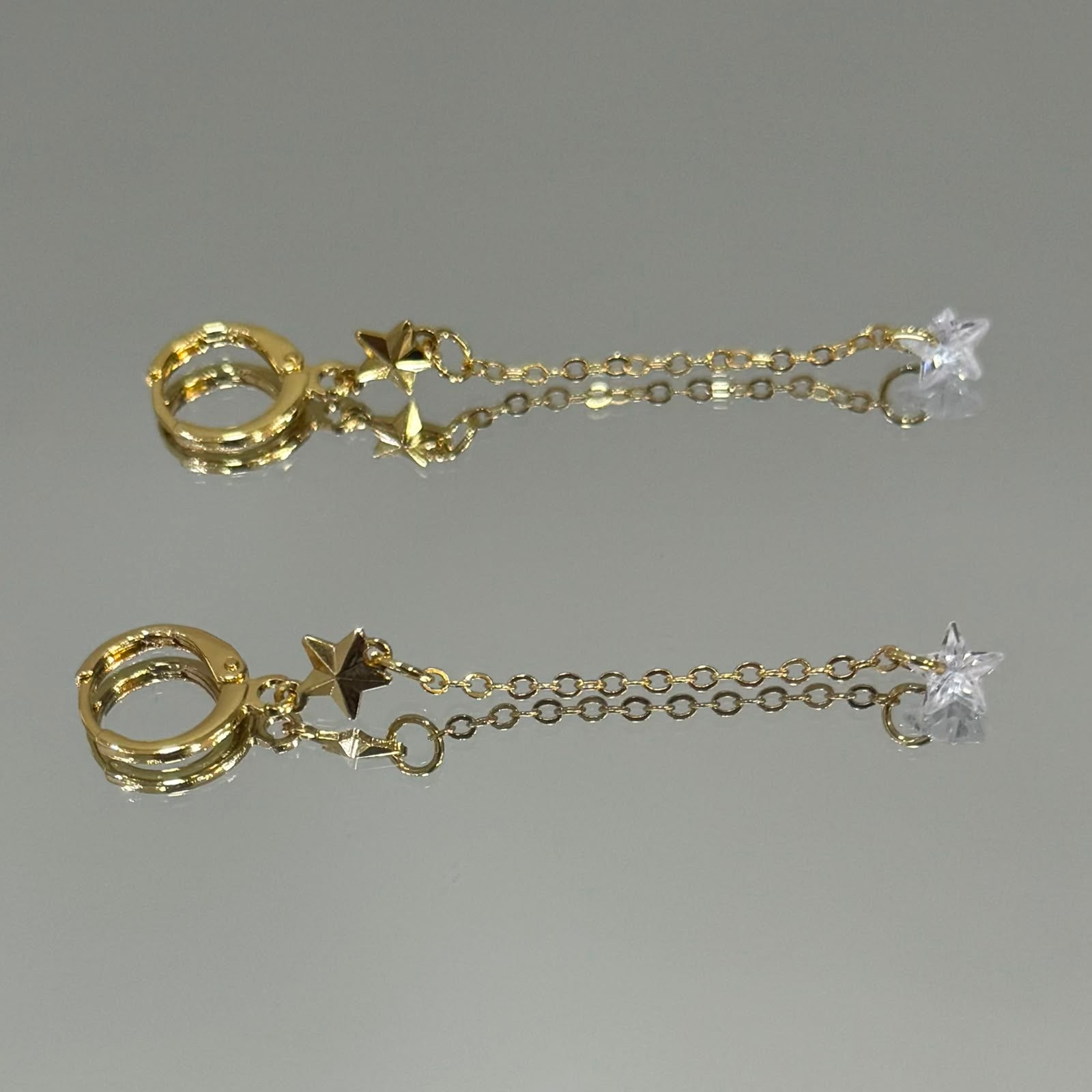 Brinco Argola Click Estrela na corrente folheado a ouro 18K