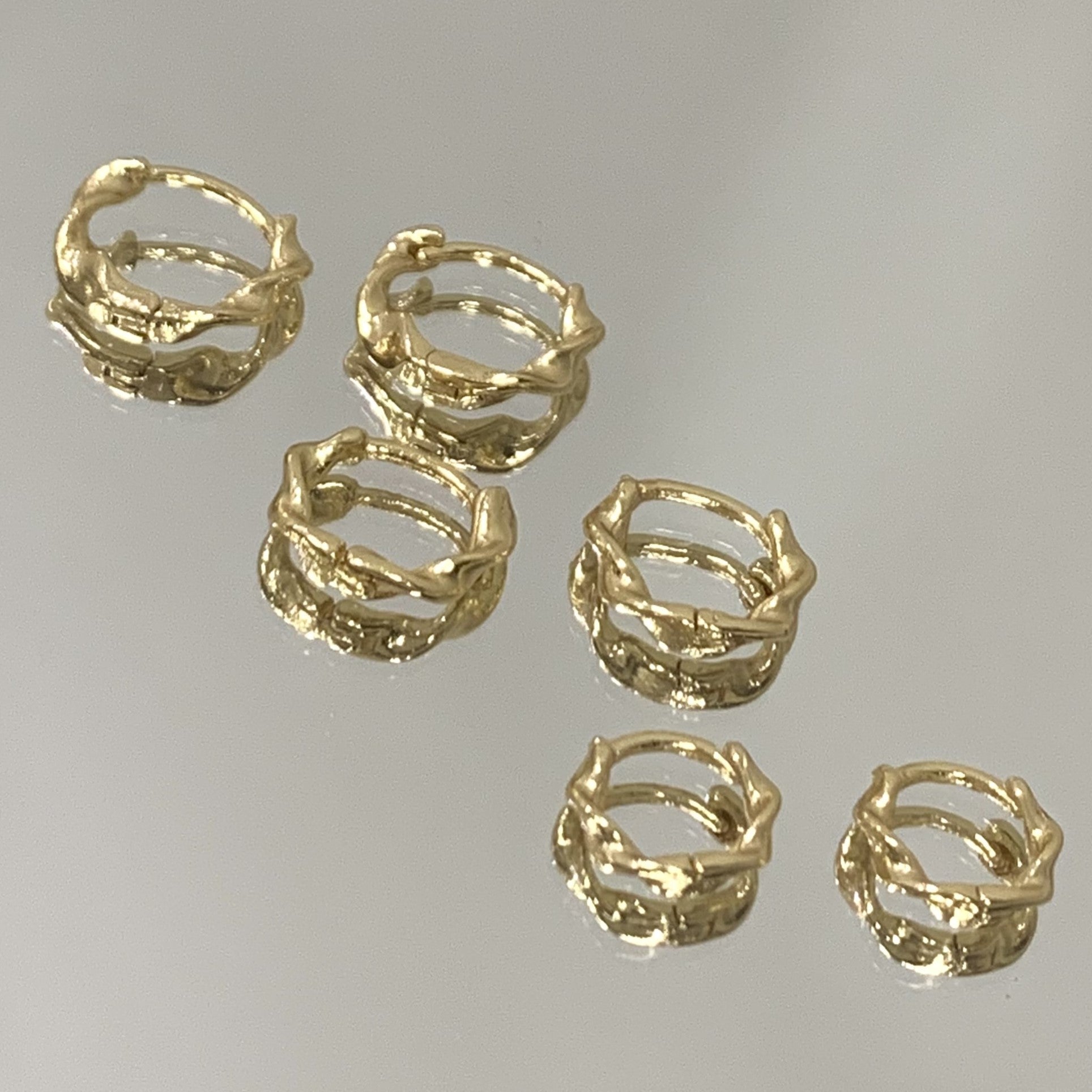 Brinco Trio argolinhas torcidas folheado a ouro 18K