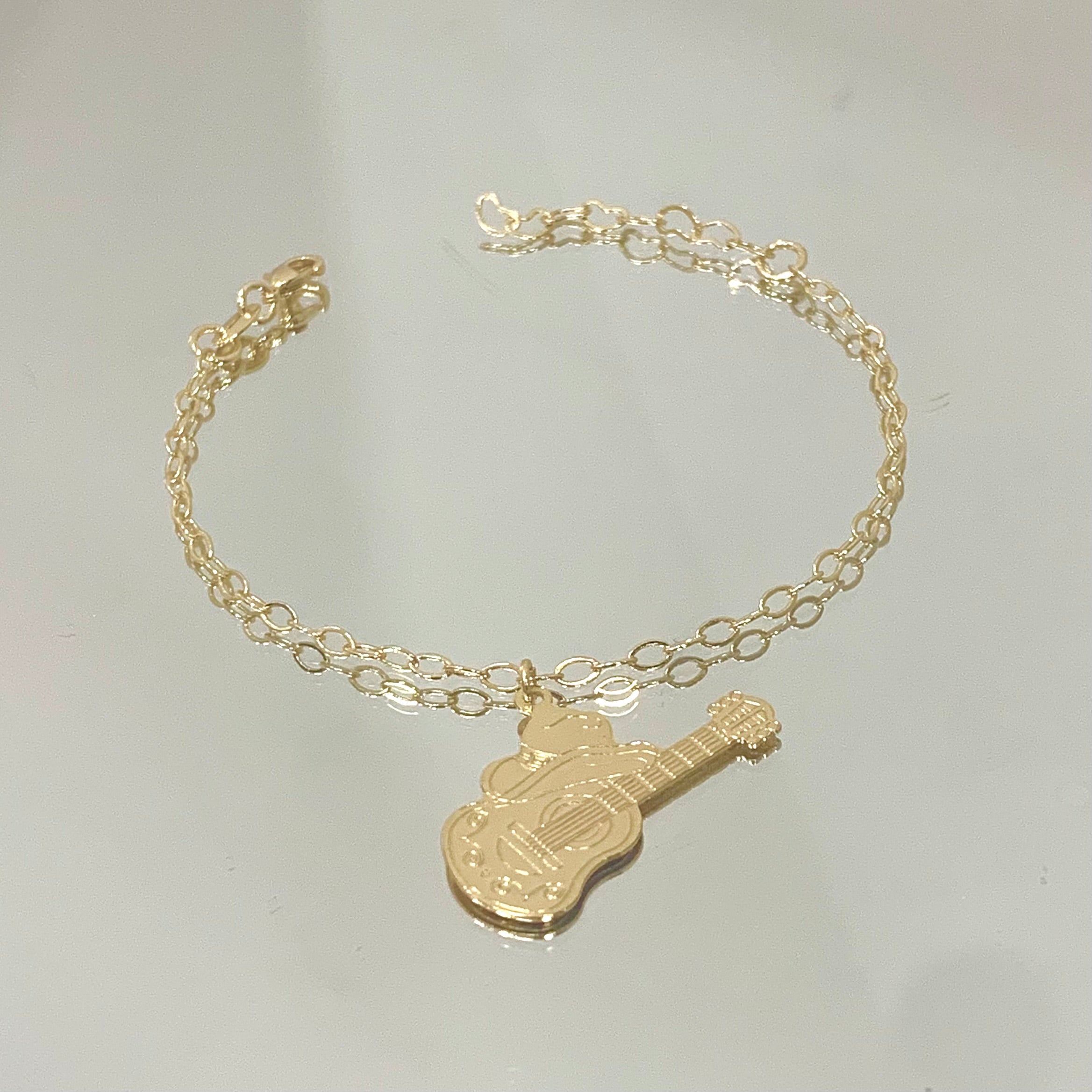 Pulseira Violão JN folheada a ouro 18K