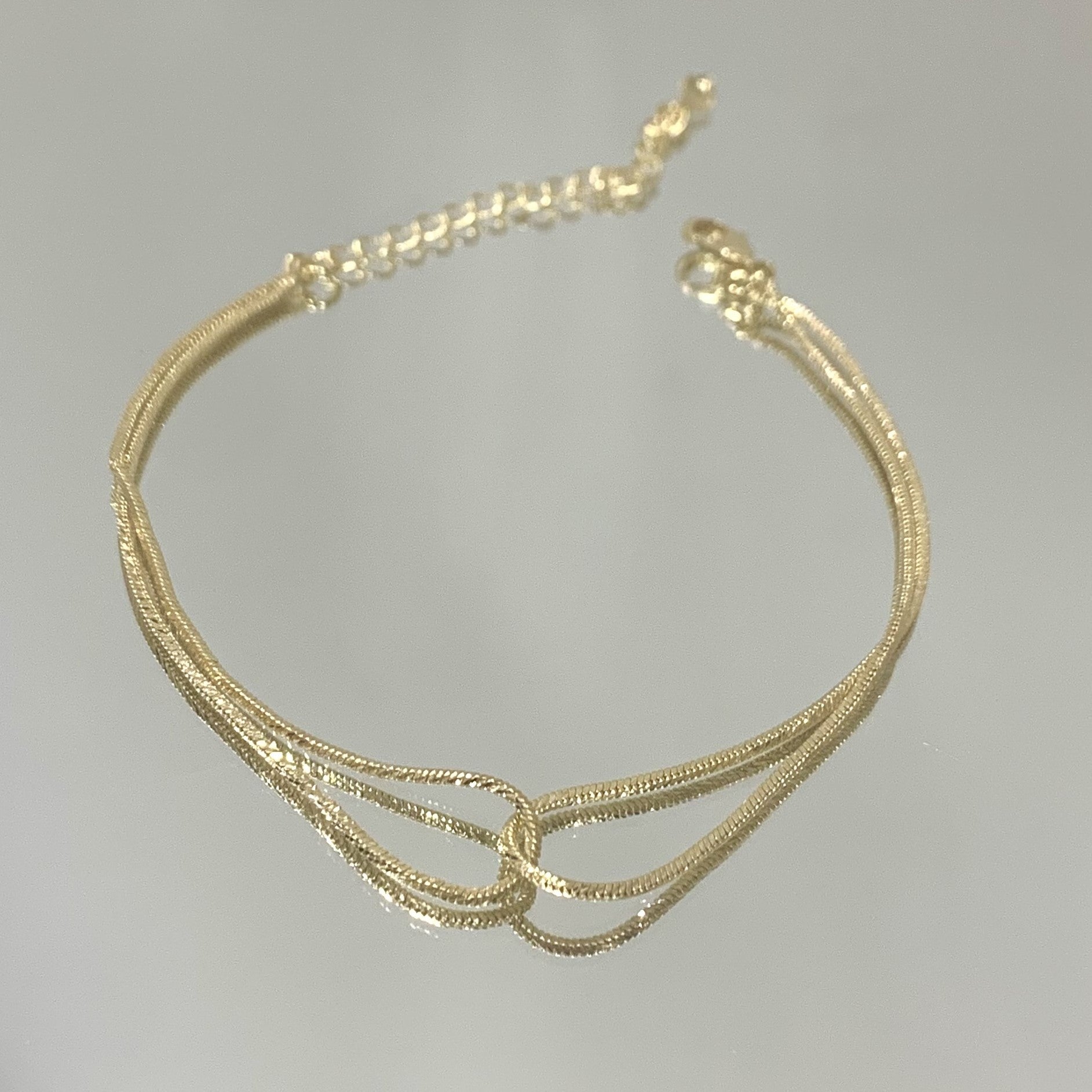 Pulseira Entrelaçada folheada a ouro 18K