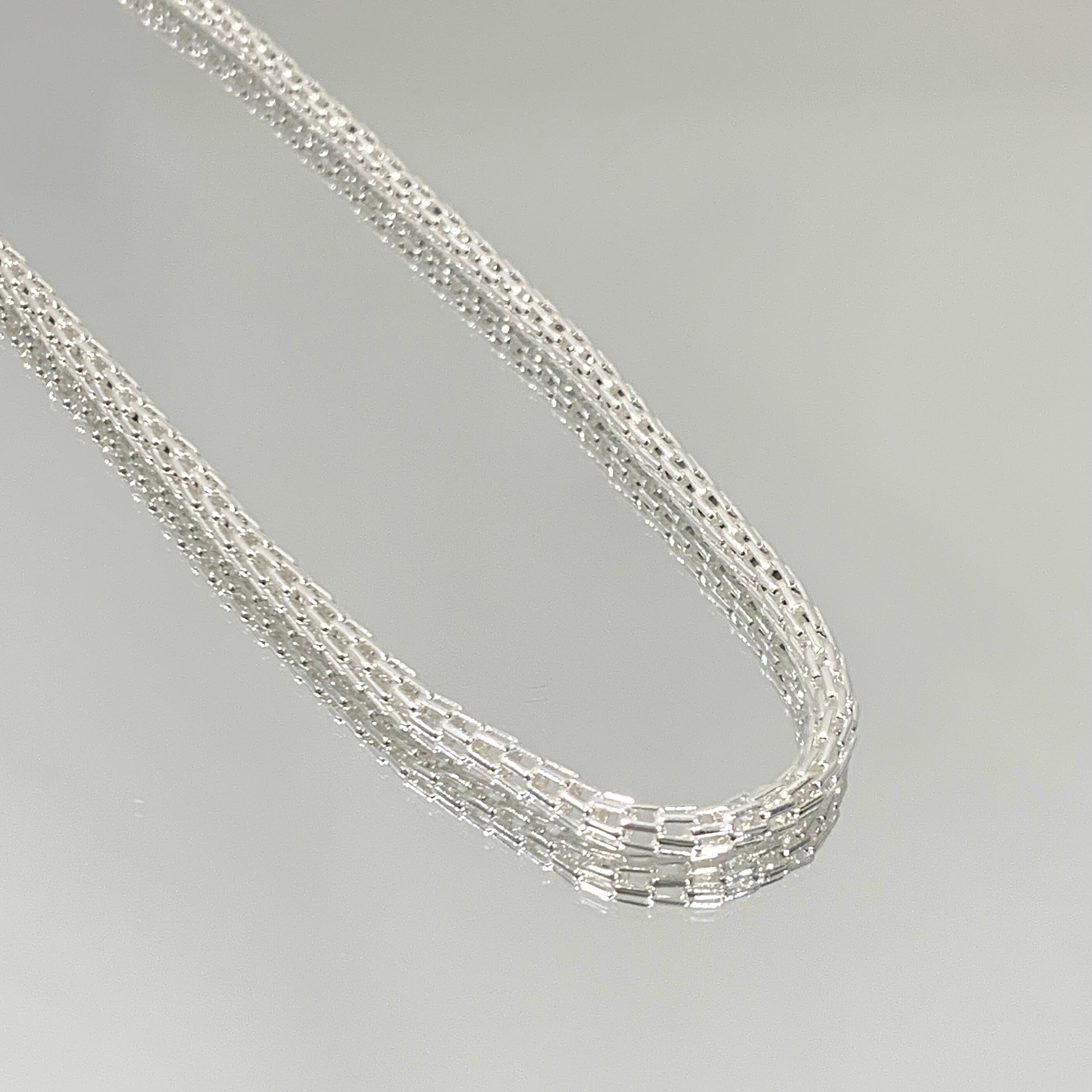 Choker Trama cilíndrica folheada a prata