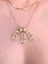 Pingente Menina de vestido folheado a ouro 18K