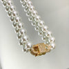 Colar de Pérolas CD cravejado folheado a ouro 18K