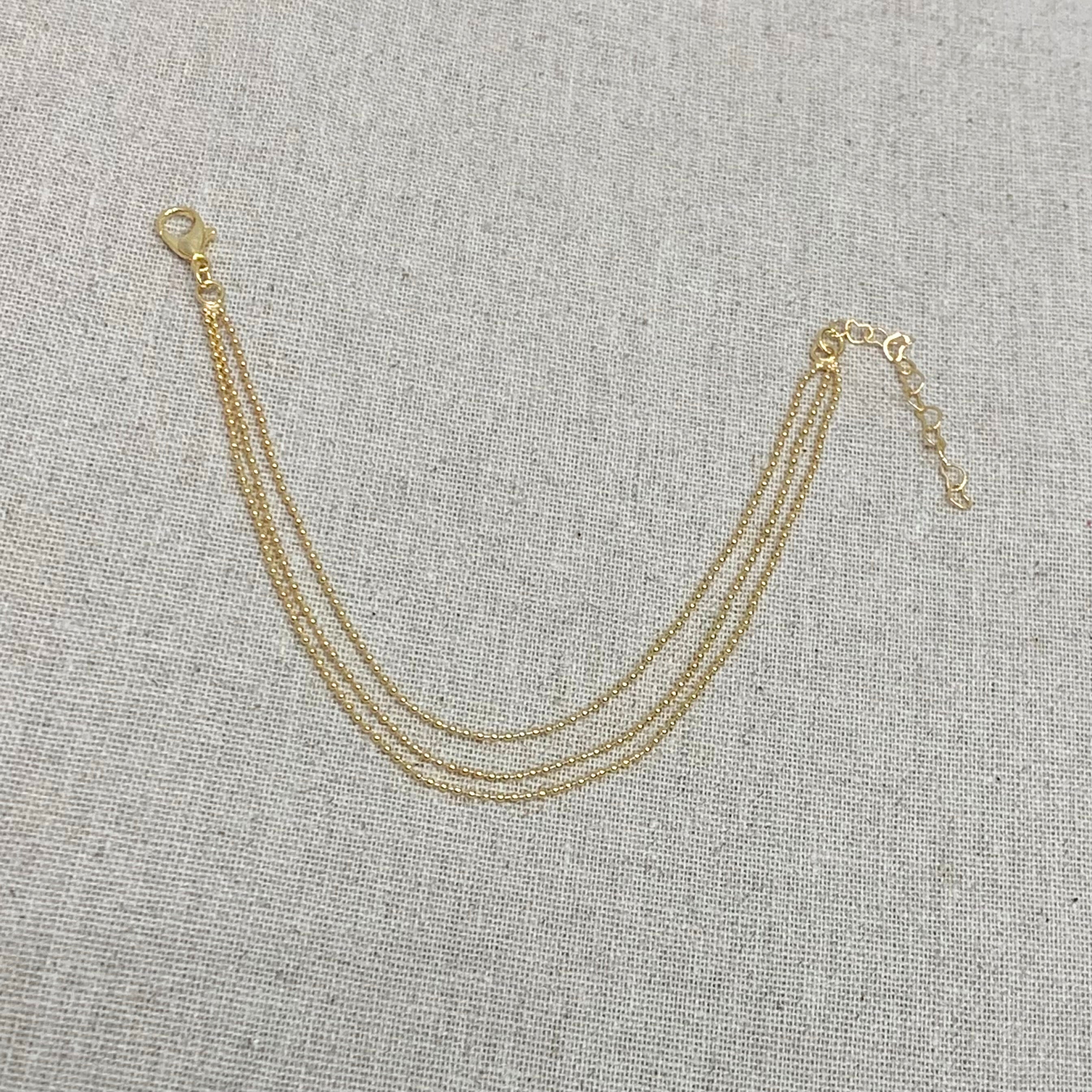 Pulseira 3 correntes de bolinha folheada a ouro 18K