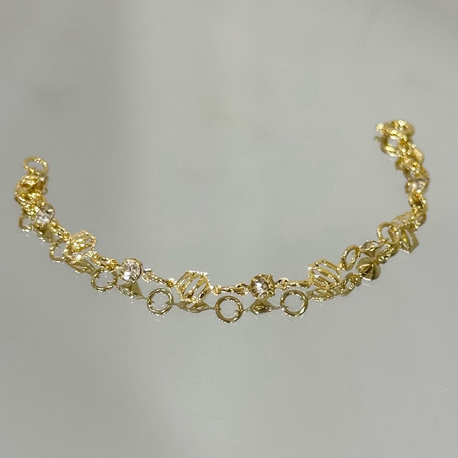 Pulseira infantil Pedrinhas alternadas folheada a ouro 18K
