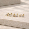 Brinco trio ponto de luz folheado a ouro 18k