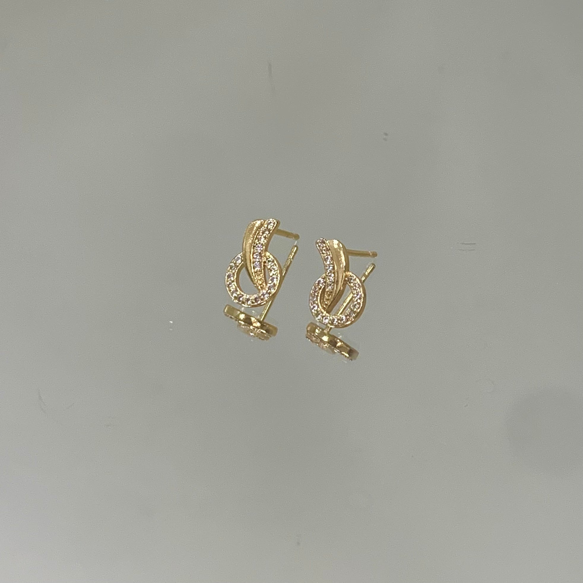 Brinco Cometa folheado a ouro 18K