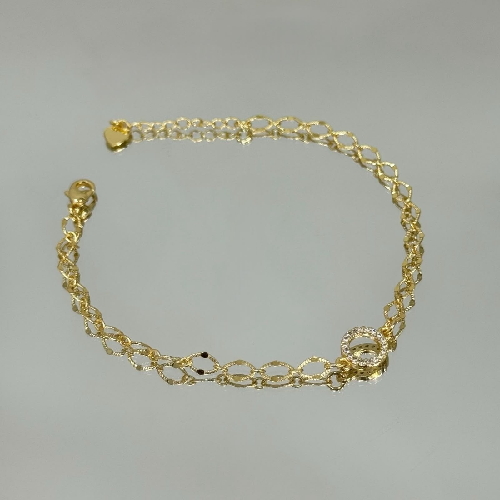 Pulseira Elos com círculo cravejado folheada a ouro 18K