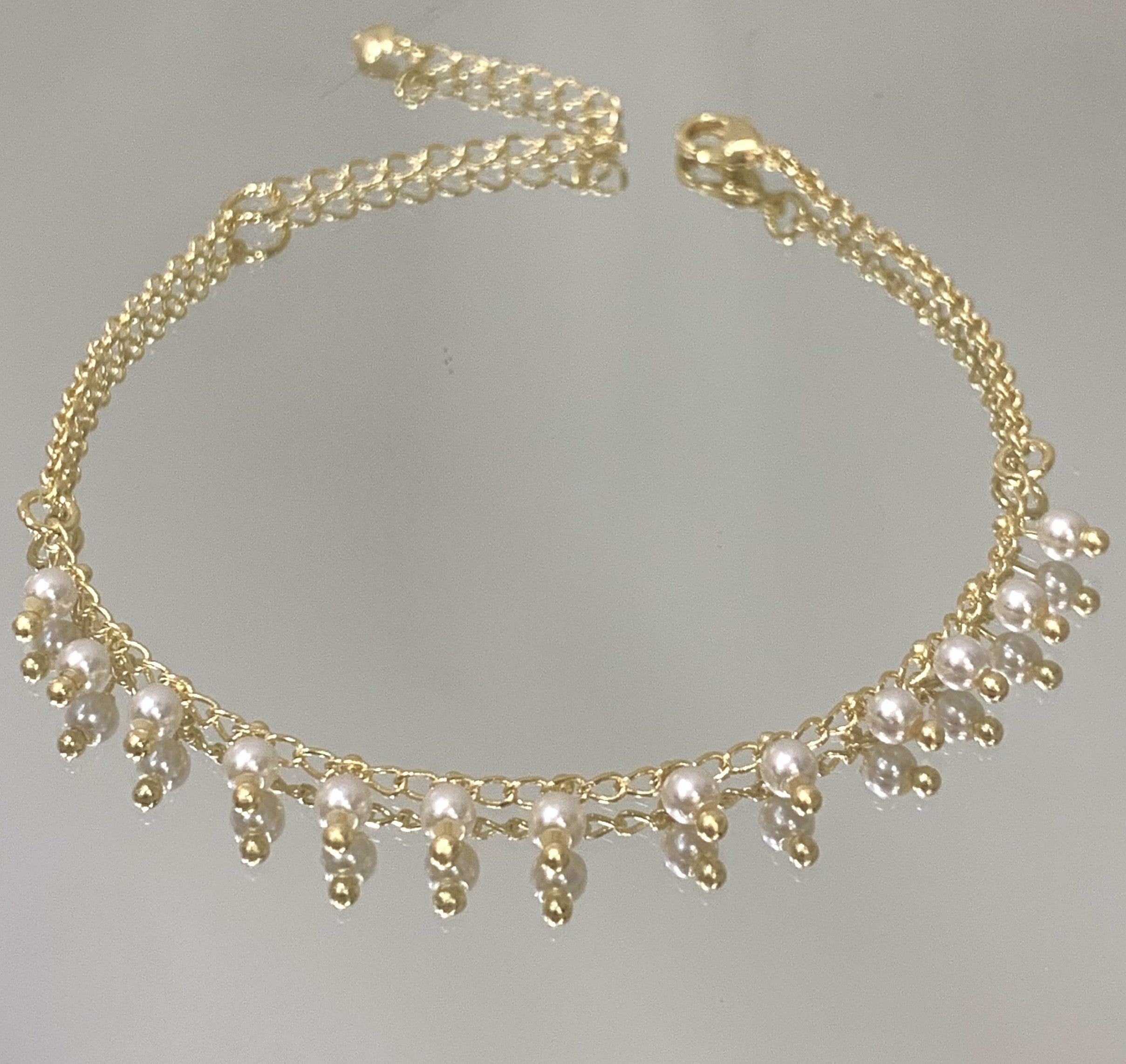 Pulseira Mini pérolas folheada a ouro 18K