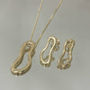 Conjunto Oval orgânico folheado a ouro 18K