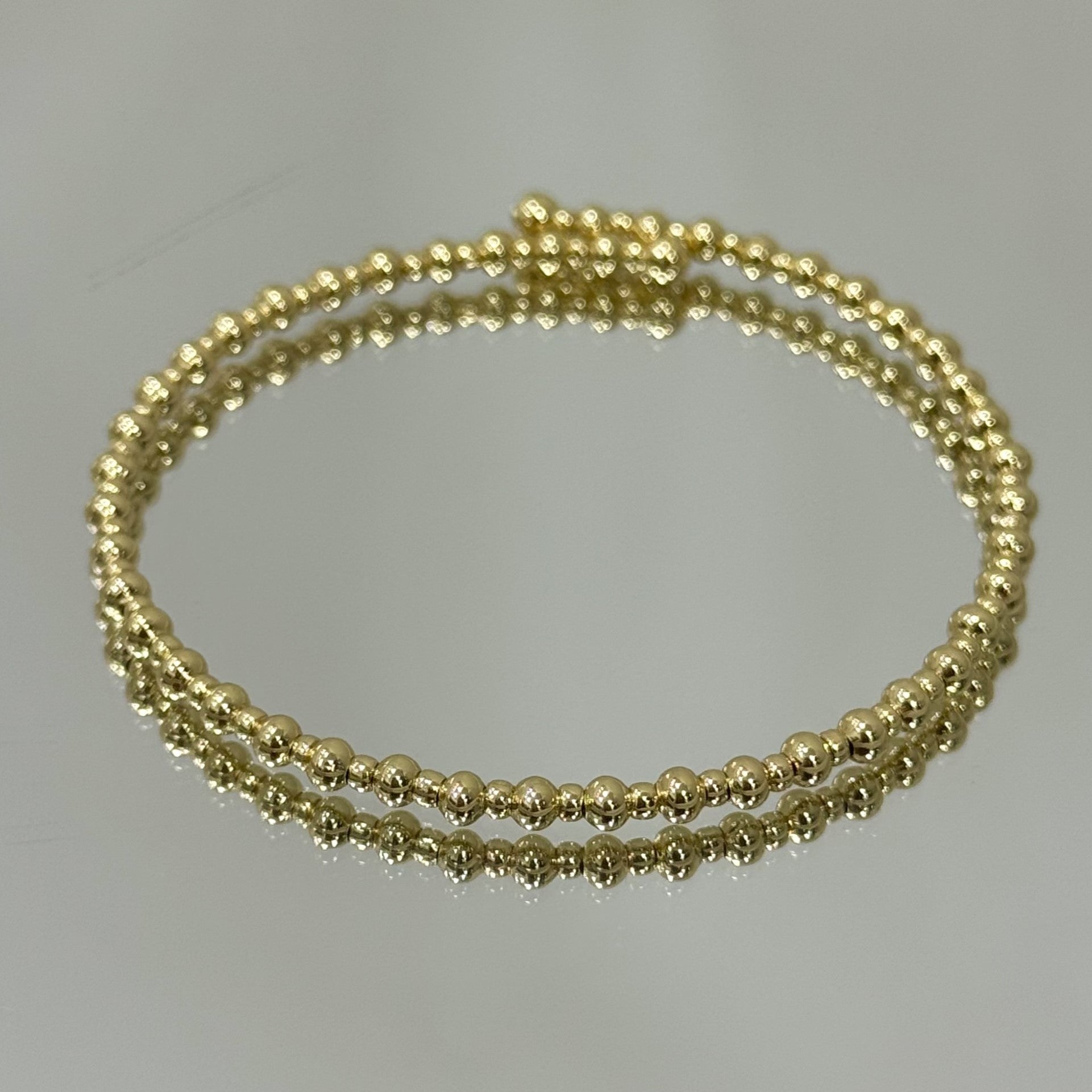 Pulseira Aro Mini Bolinhas folheada a ouro 18K