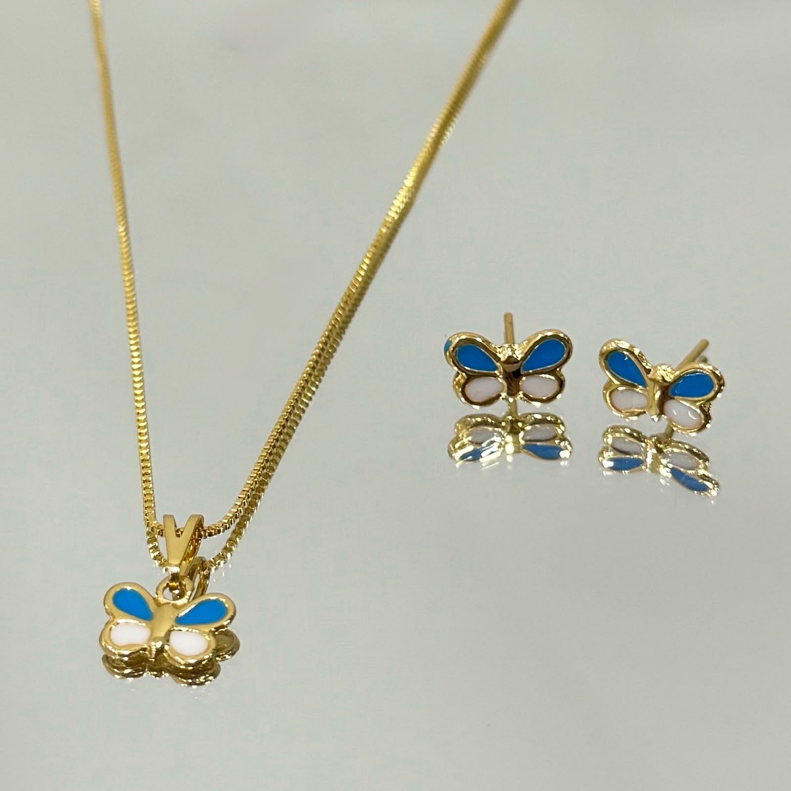 Conjunto Infantil Borboleta azul em resina folheado a ouro 18K