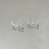 Brinco Earhook X folheado a prata