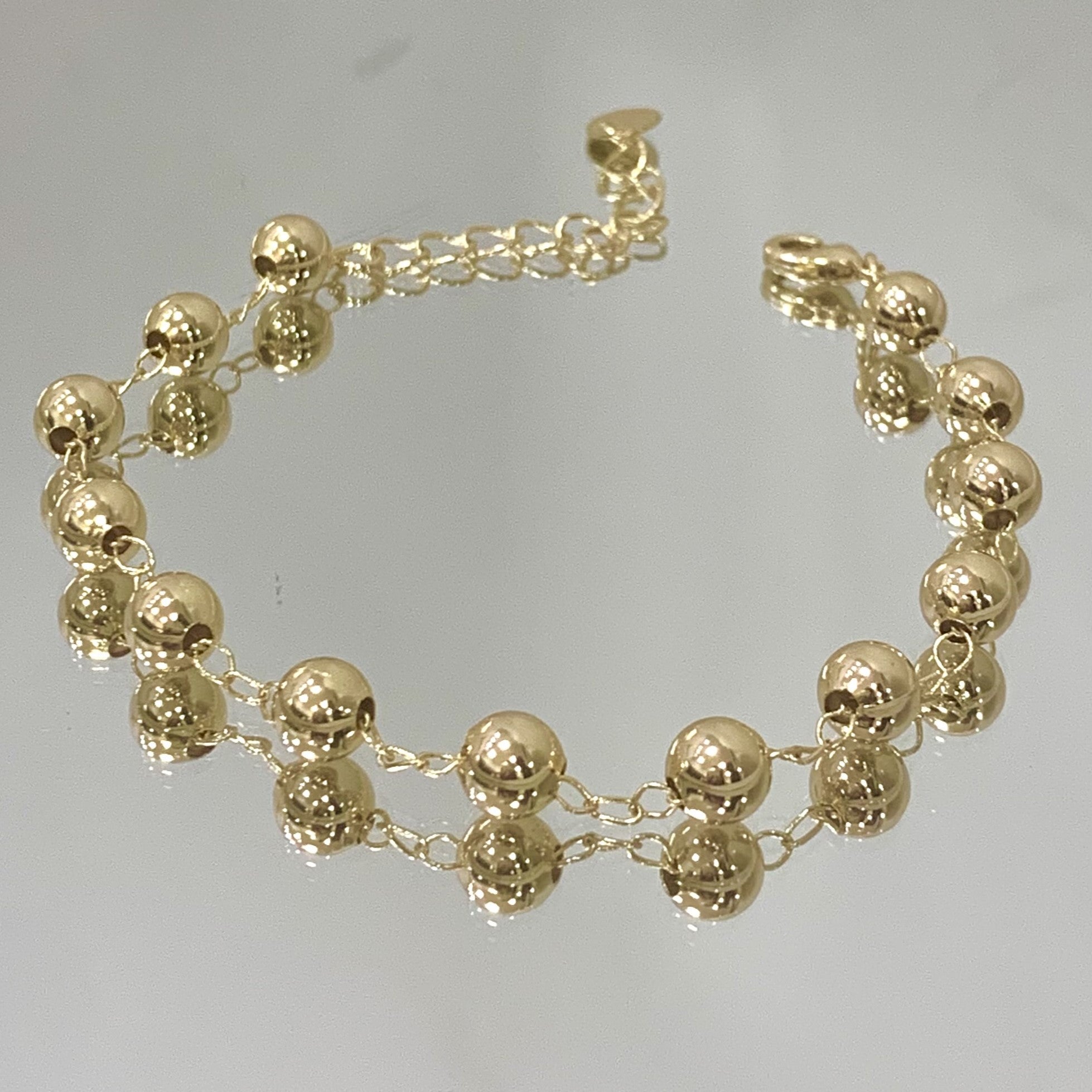 Pulseira Bolinhas na corrente folheada a ouro 18K