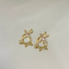 Brinco Cruz cravejada folheado a ouro 18K