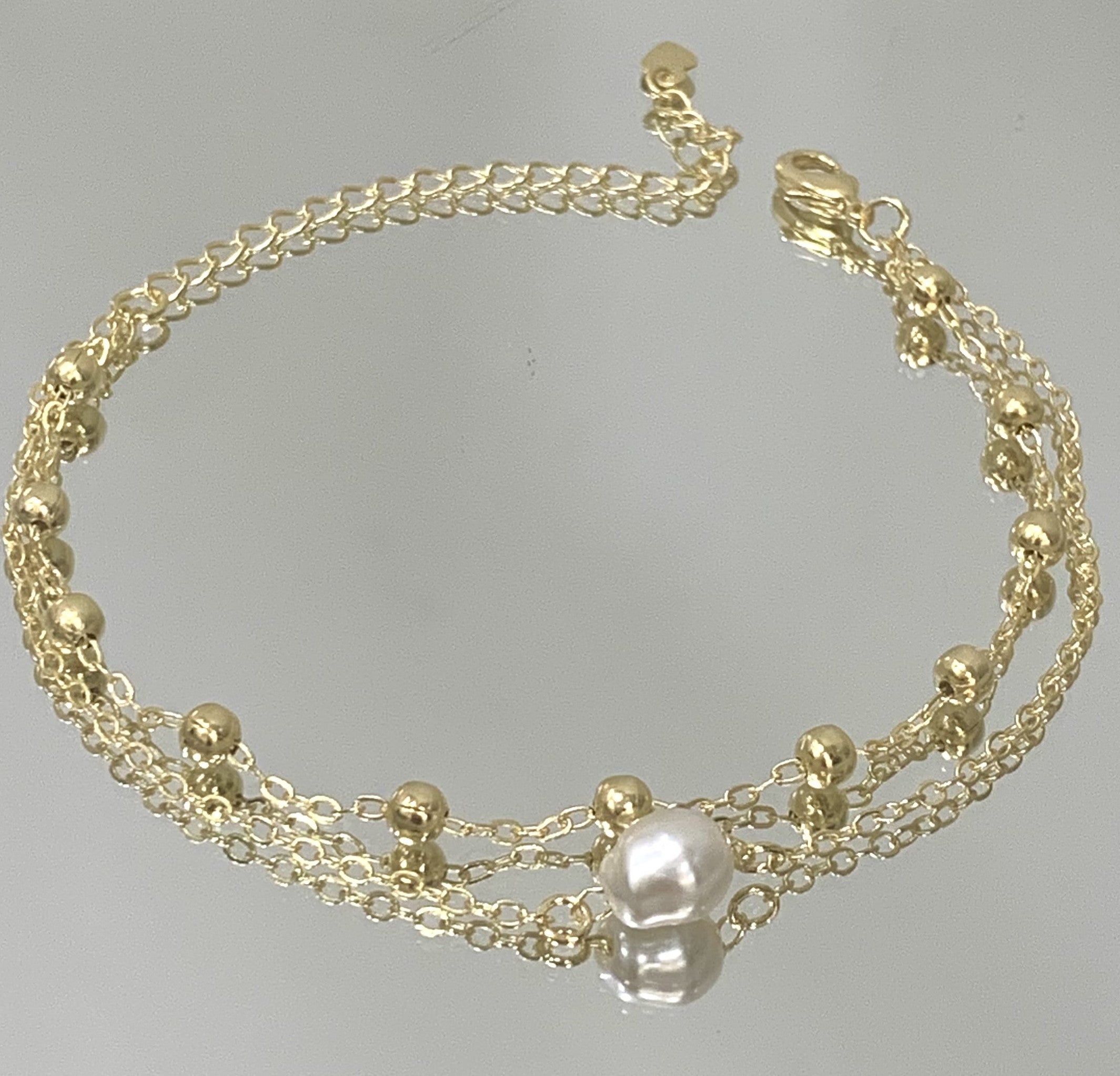 Pulseira Dupla com pérola barroca folheada a ouro 18K