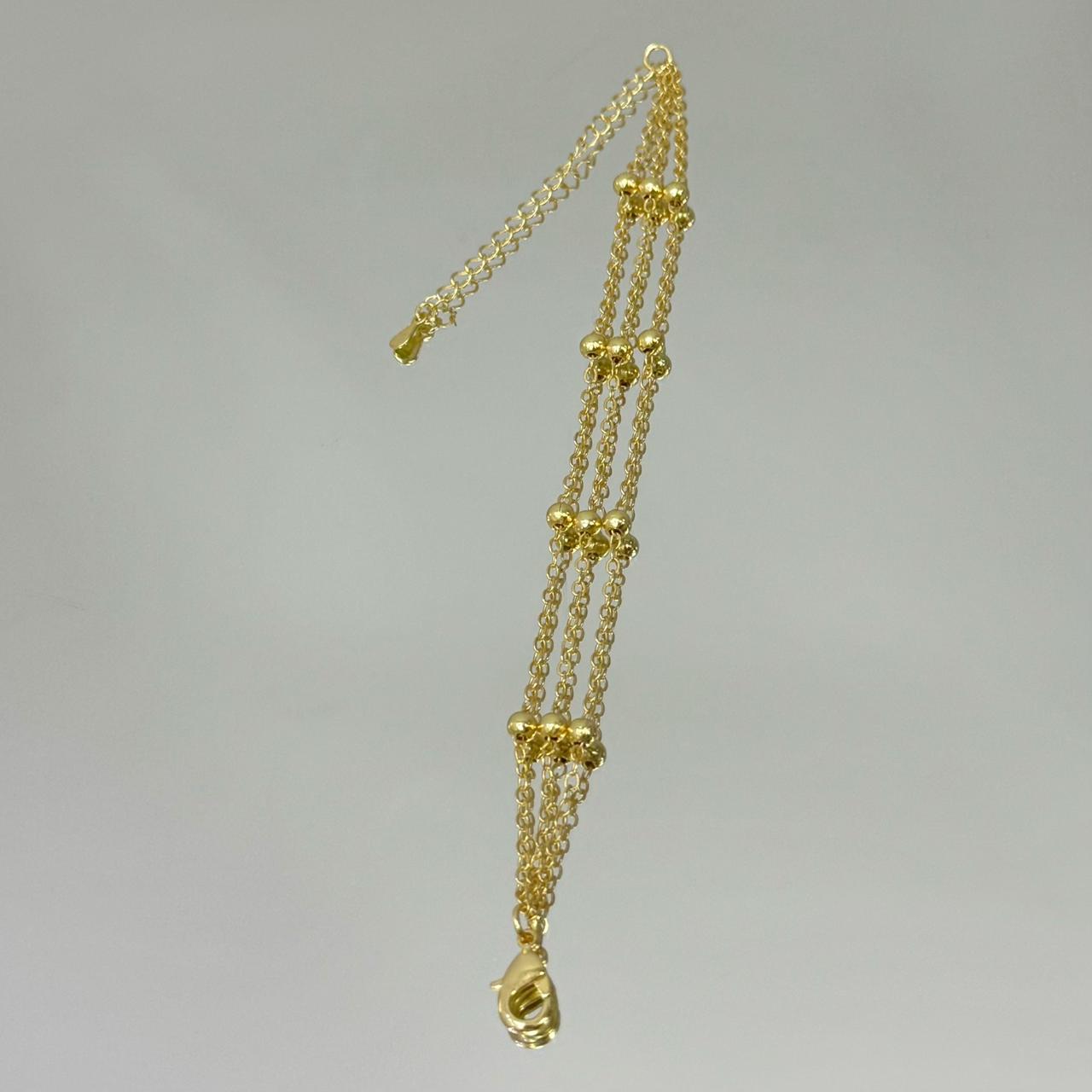Pulseira tripla bolinhas folheada a ouro 18K