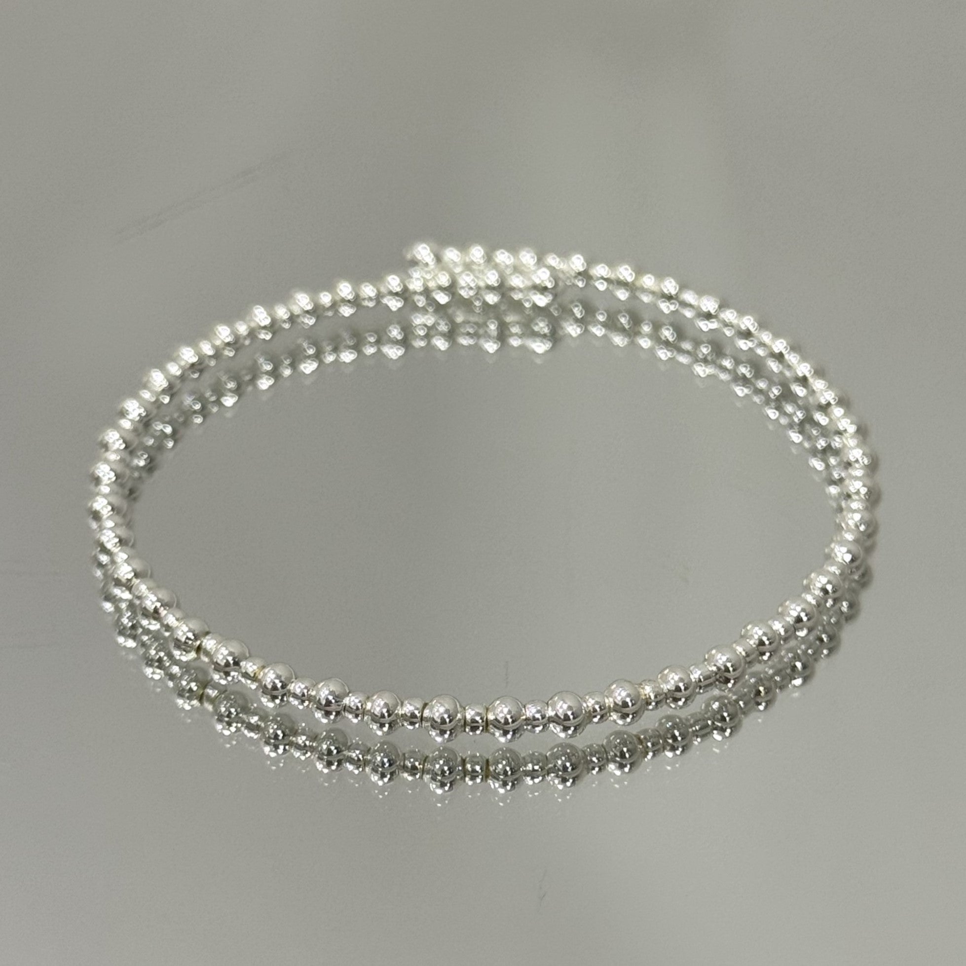 Pulseira Aro Mini Bolinhas folheada a prata