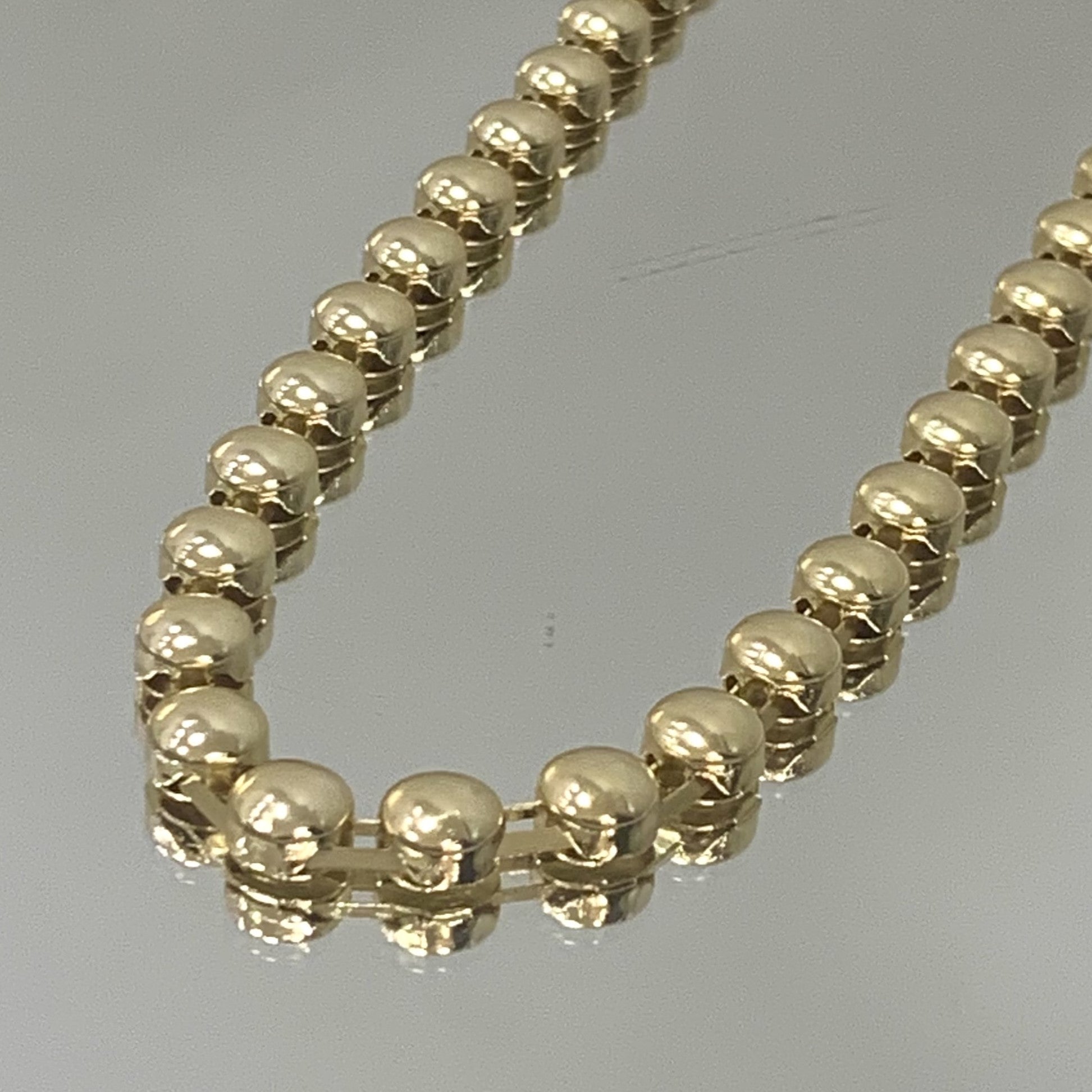 Colar meia esferas folheado a ouro 18K