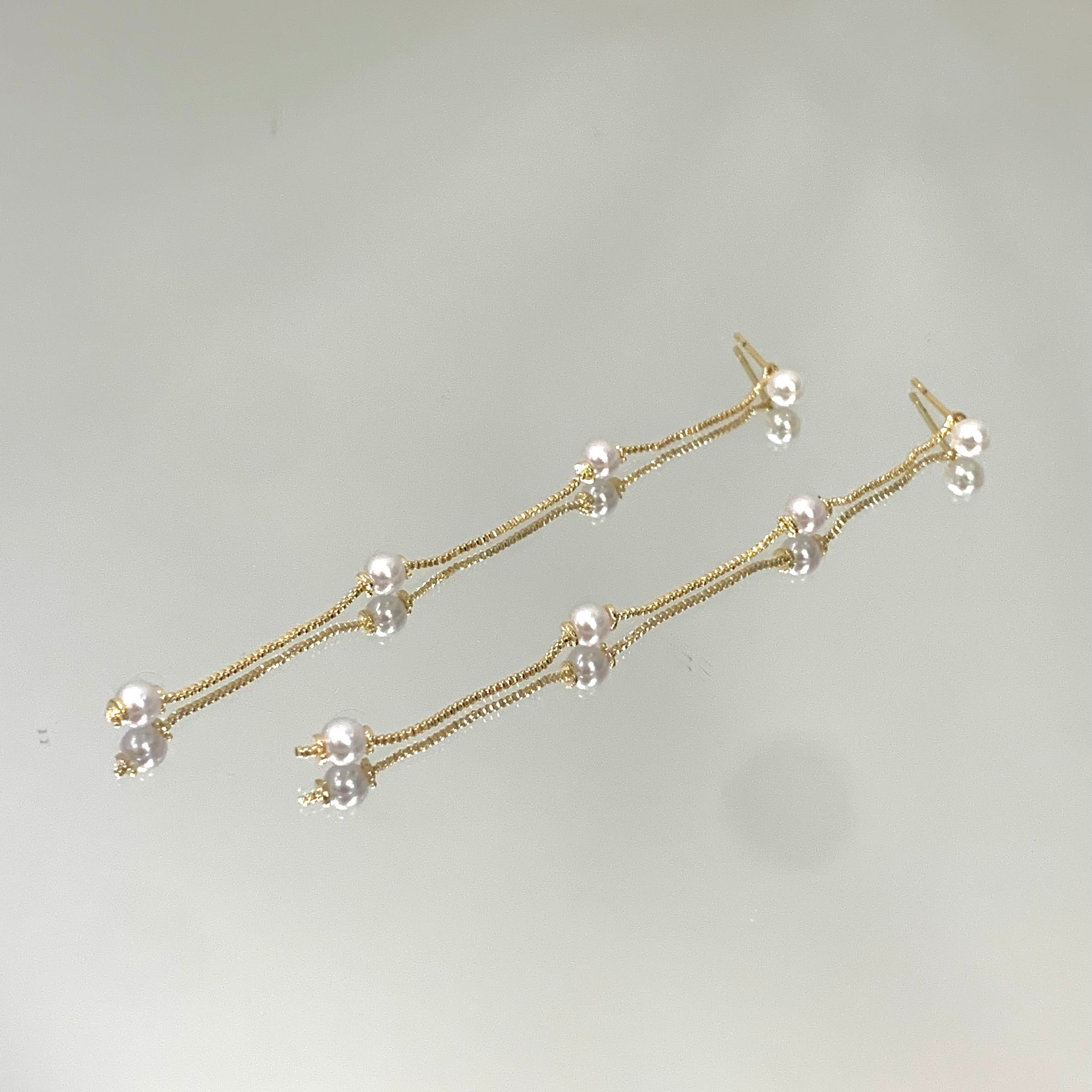 Brinco Pendente 4 Pérolas folheado a ouro 18K
