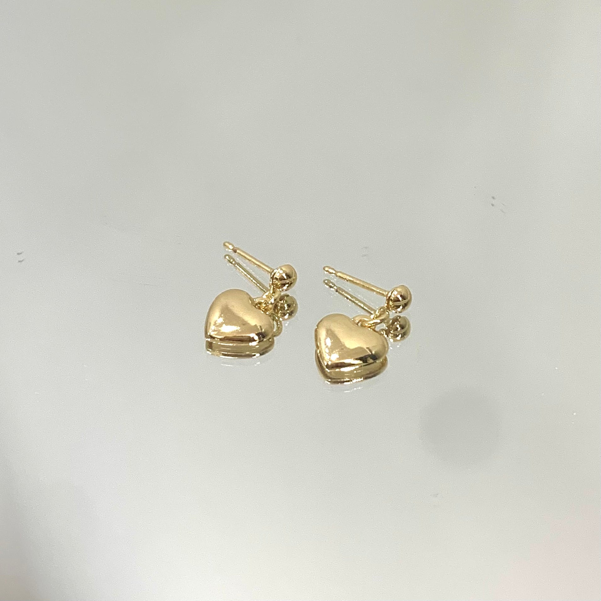 Brinco Coração Pendente folheado a ouro 18K