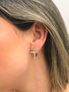 Brinco Cruz cravejada folheado a ouro 18K